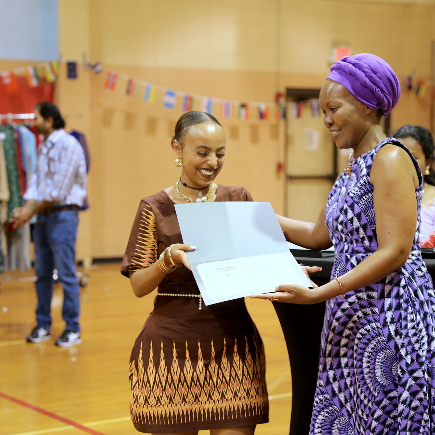 Rodas receives her Graduation Certificate